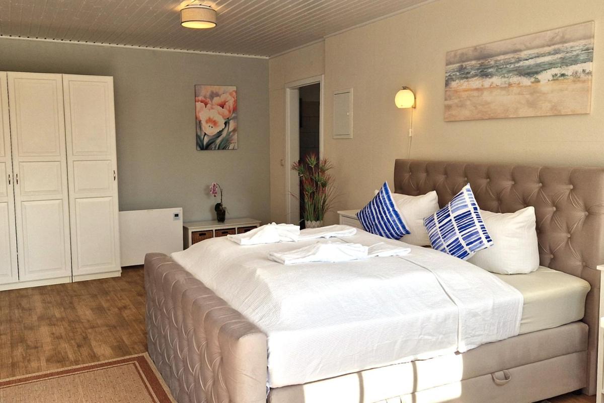 בולטנהאגן Ferienbungalow Haus Am Teich מראה חיצוני תמונה
